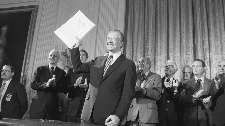 Jimmy Carter holds 1980 Alaska Lands Act