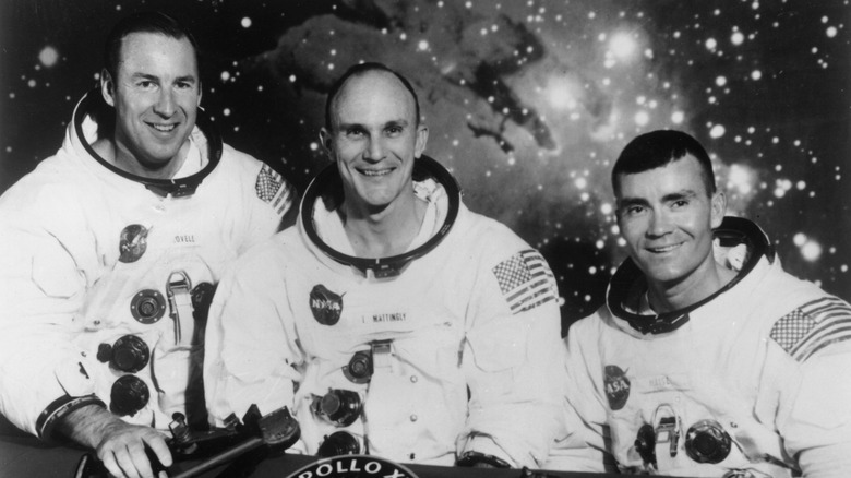 Original crew Apollo 13 spacesuits group photo