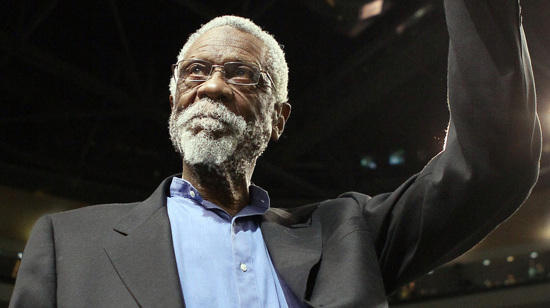 Bill Russell waves to cheering fans