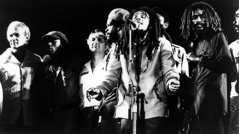 Bob Marley and the Wailers performing with Edward Seaga and Michael Manley onstage