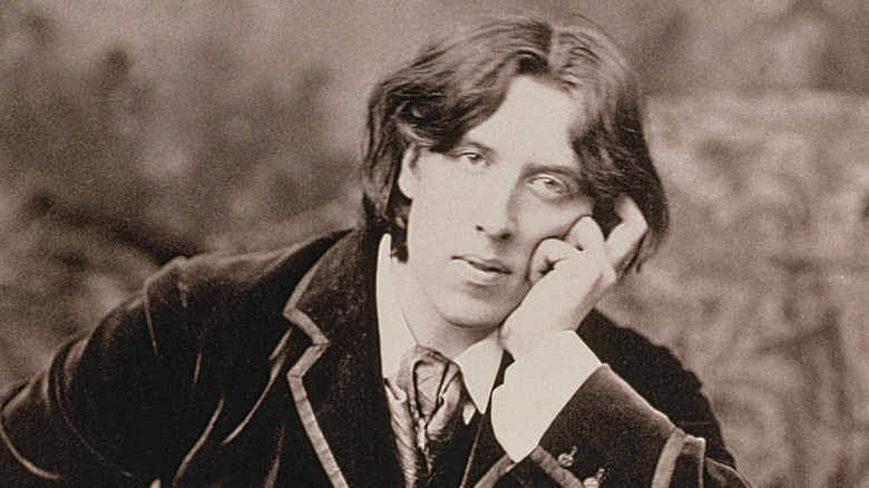 Oscar Wilde resting head on hand