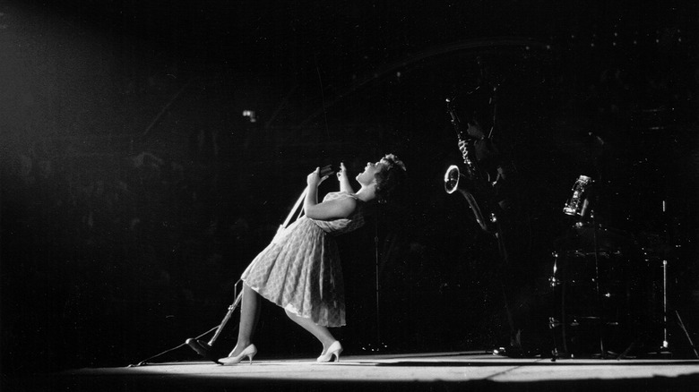 brenda lee performing on stage in 1960