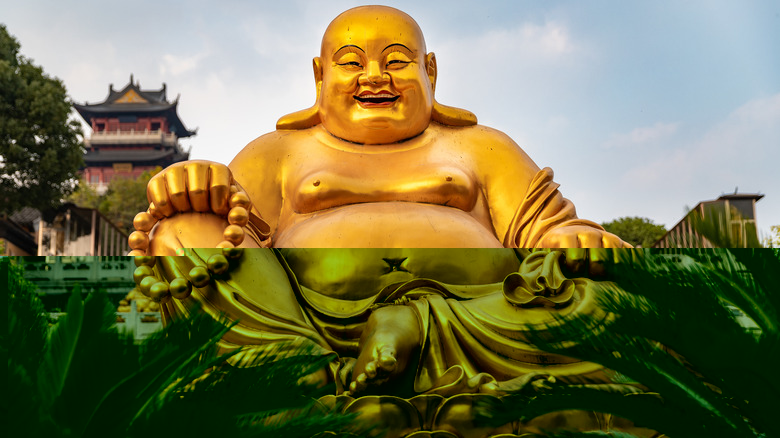 laughing buddha gold statue