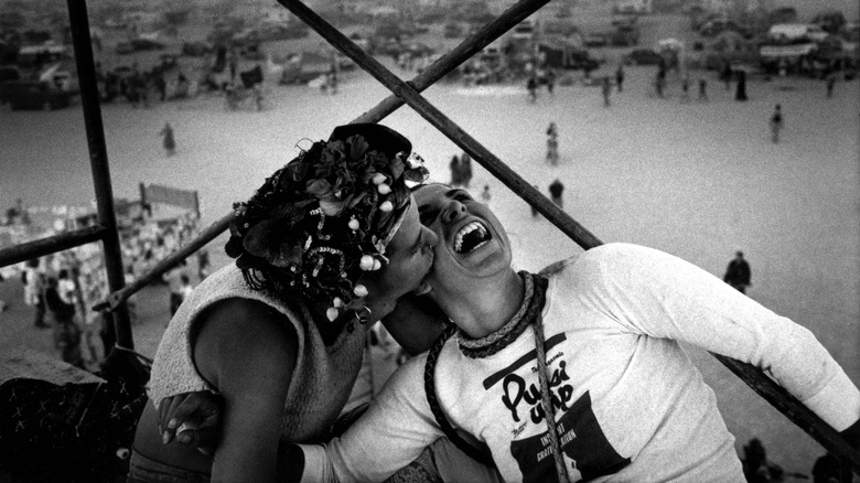 Couple smiling laughing at Burning Man