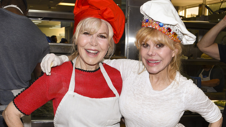 Charo and her sister in a kitchen