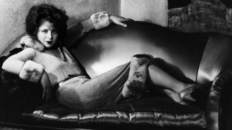 Clara Bow on a leather couch