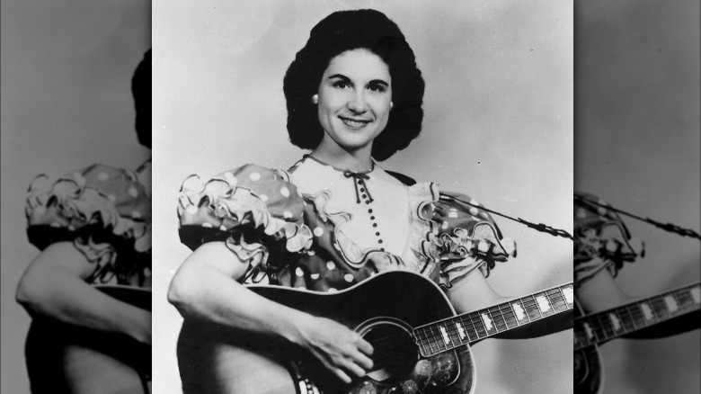 Kitty Wells with guitar