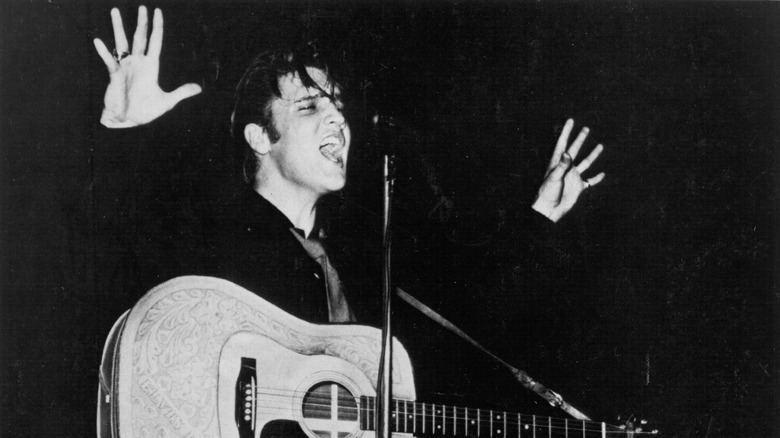 Elvis Presley performing in 1956