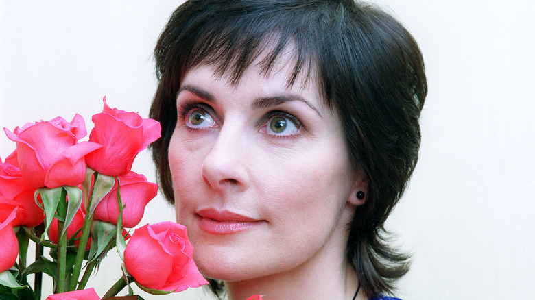 Enya with red roses
