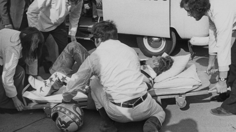 Evel Knievel lying on ground