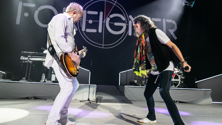 one version of foreigner performing on stage