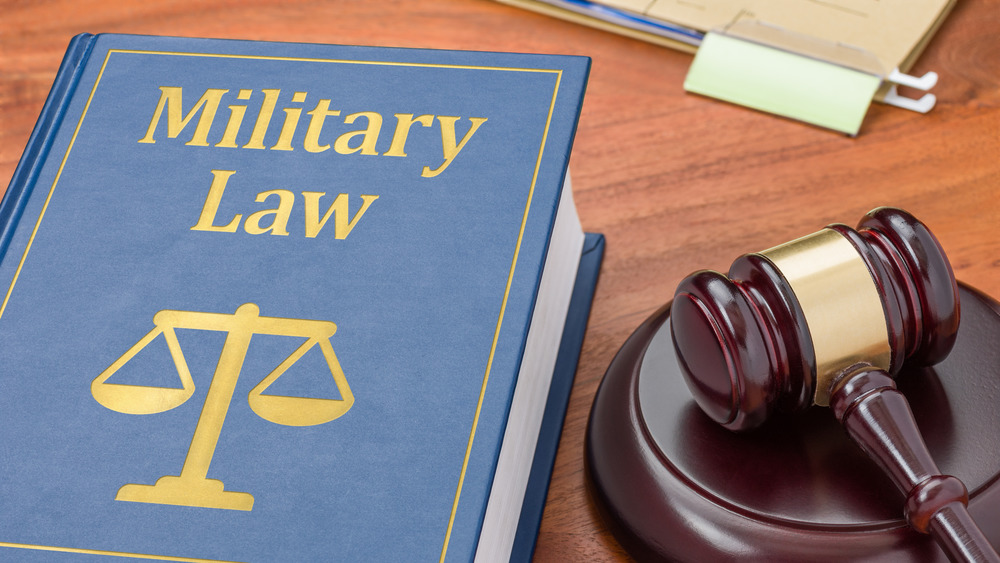 military law book with gavel