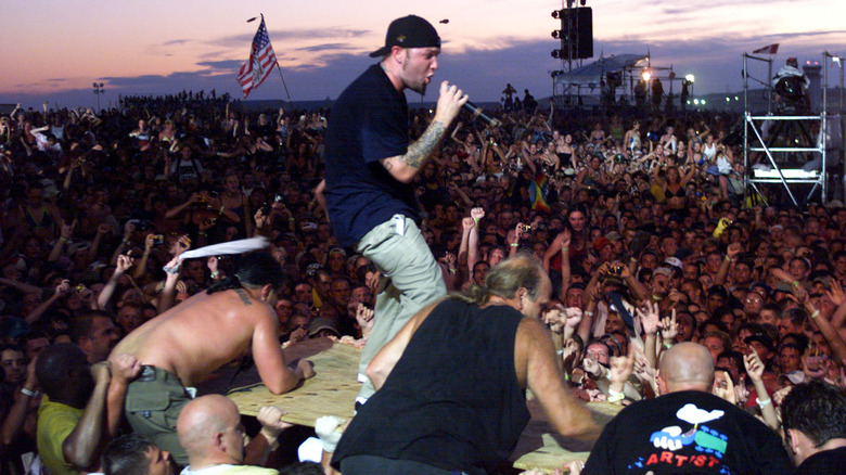 Fred Durst crowd surfs at Woodstock '99