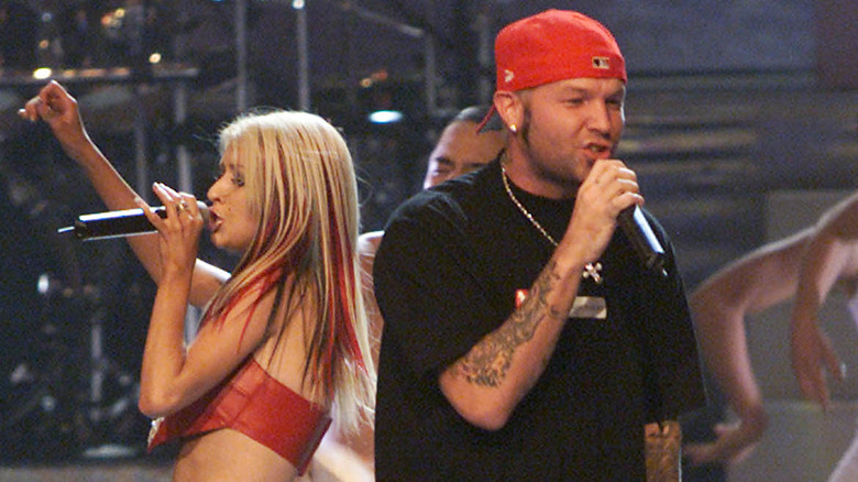 Christina Aguilera and Fred Durst perform together