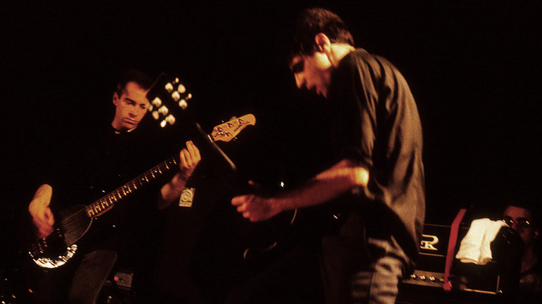 Joe Lally and Guy Picciotto on stage
