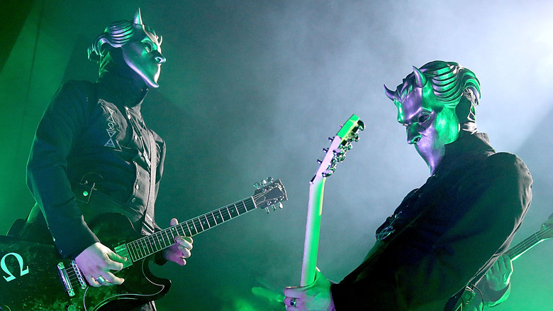 two nameless ghouls playing guitar