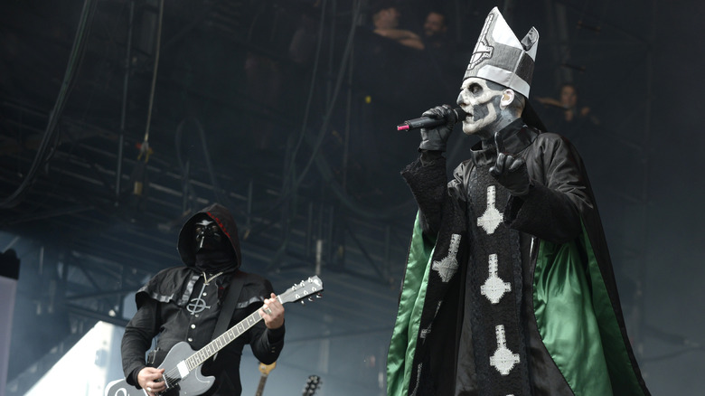 papa ghost with guitar player