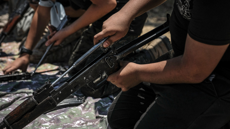 kids using guns at a Hamas summer camp