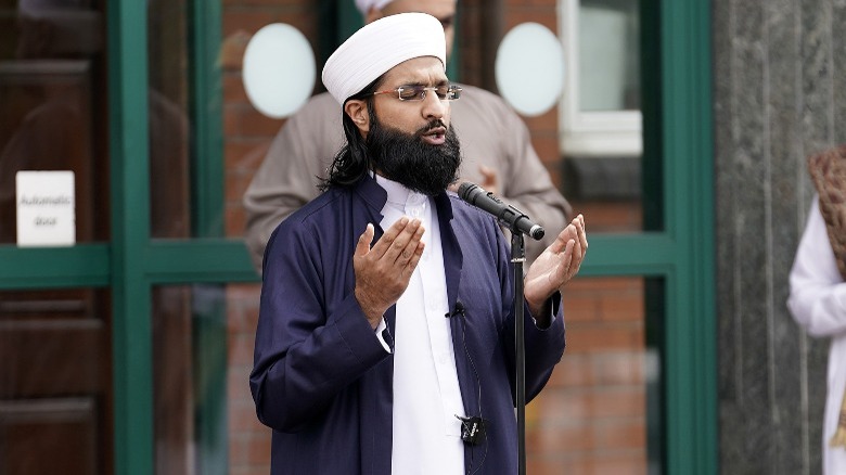 An Imam leading prayer