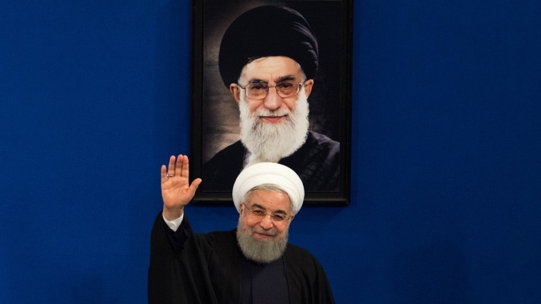 President of Iran waving