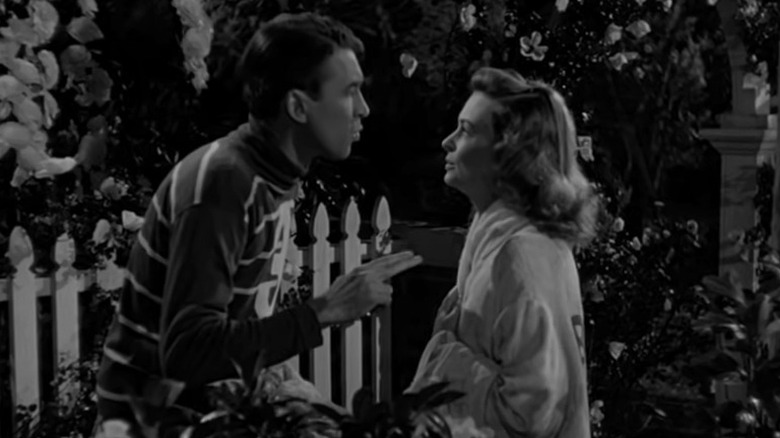 Jimmy Stewart and Donna Reed harmonize in the hydrangeas