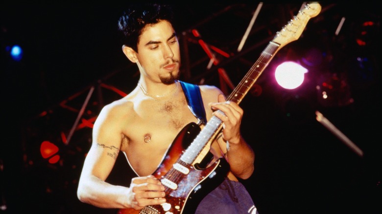 Guitarist Dave Navarro playing the guitar on stage
