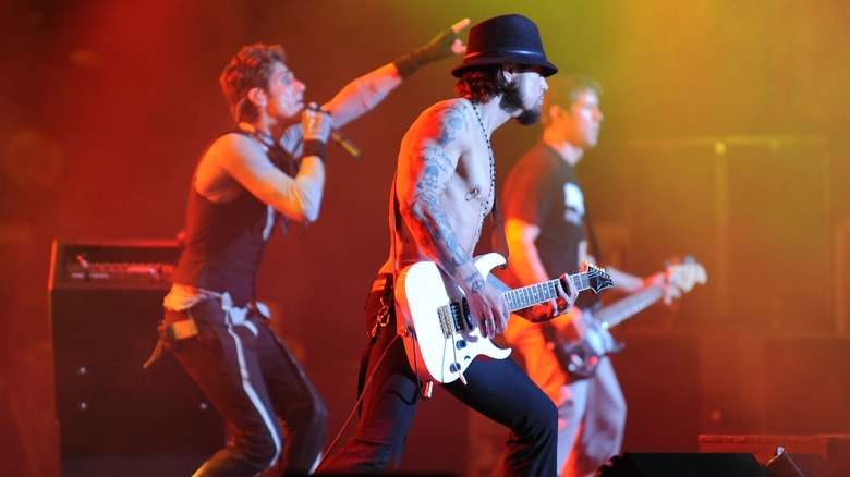 The band Jane's Addiction playing a show live on stage