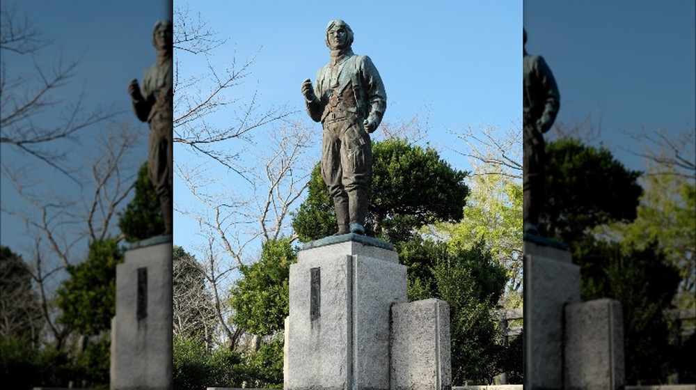 statue of a kamikaze pilot in a park