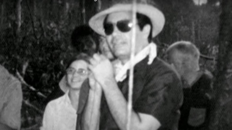 Rev Jim Jones wearing sunglasses