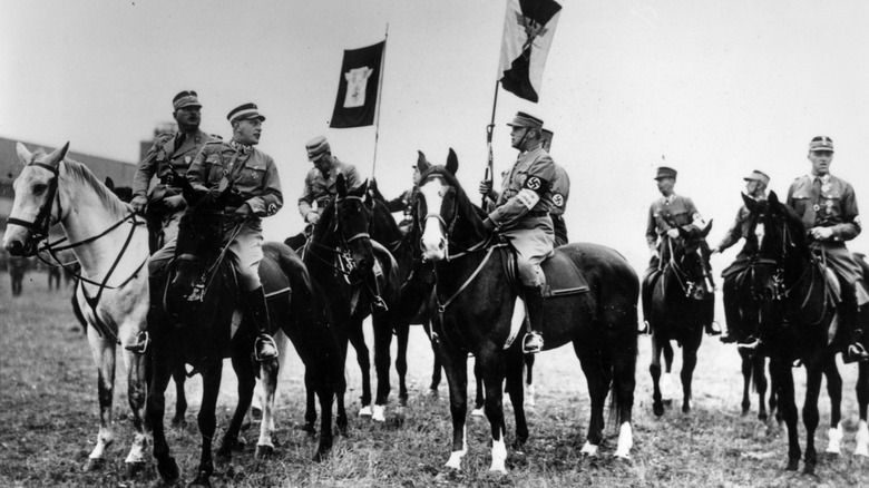 Ernst Roehm with a group of Nazis on horseback