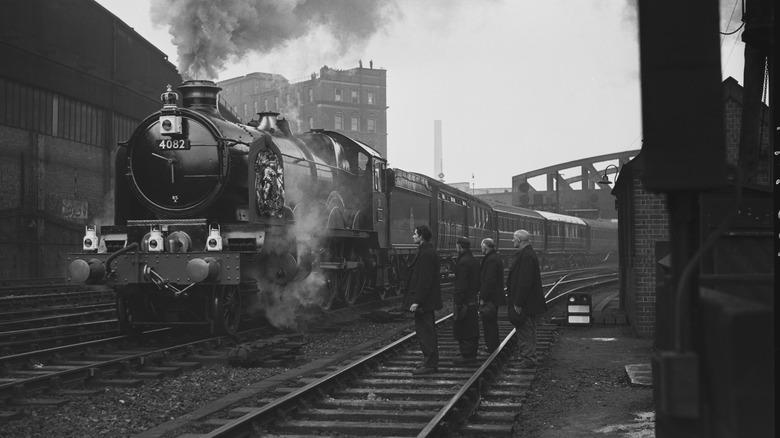 The train bearing George VI's coffin departs the station