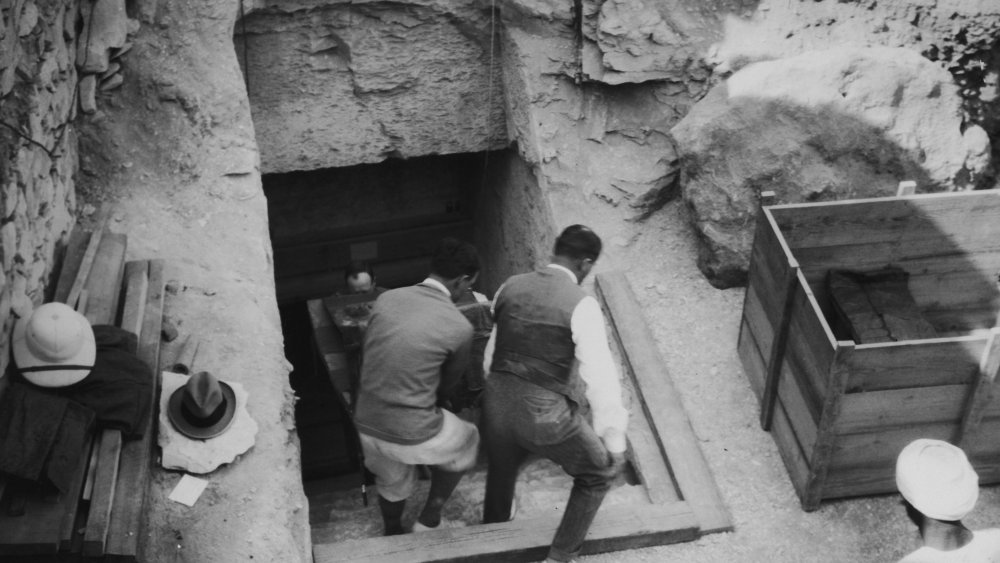 Explorers entering King Tut's tomb