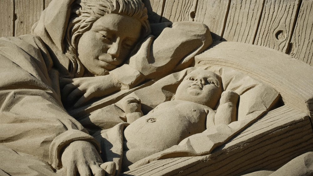 sand sculpture of Mary and Jesus