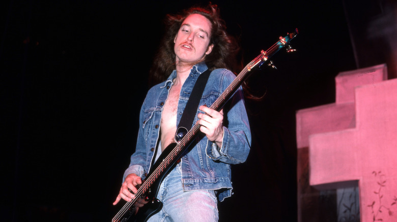 Cliff Burton playing bass guitar