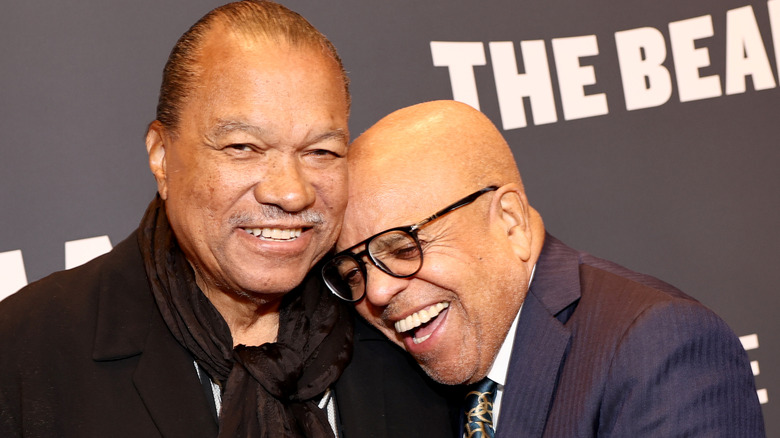Berry Gordy laughs with Billy Dee Williams