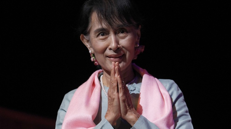 Aung San Suu Kyi bows
