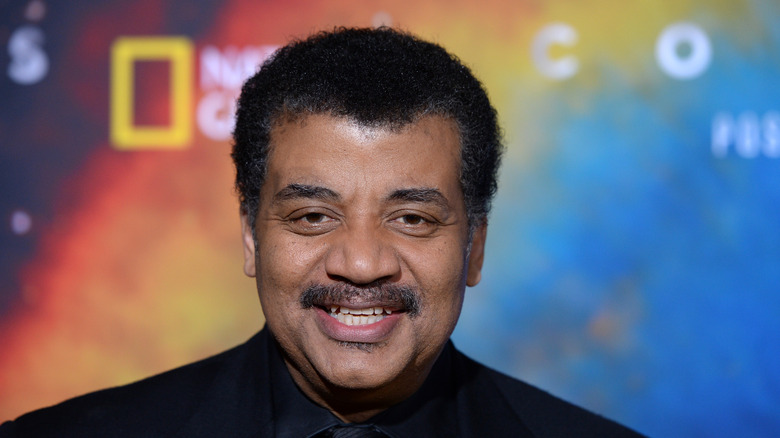  Neil deGrasse Tyson smiling in a candid photo