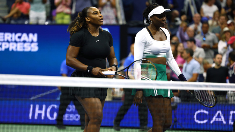 Venus and Serena Williams on court