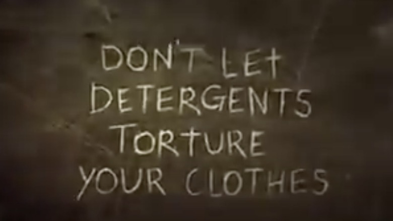sign saying 'don't let detergents torture your clothes'