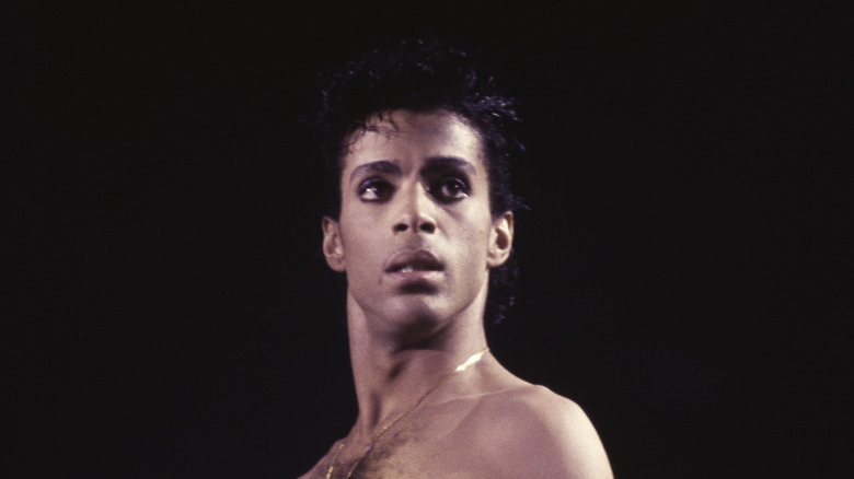 Prince shirtless on stage