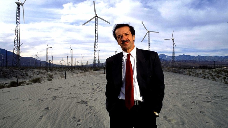 sonny bono standing in front of wind turbines