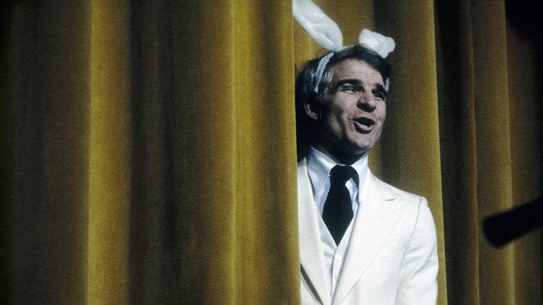 Steve Martin on stage wearing bunny ears