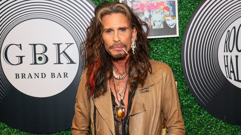 Steven Tyler with toothpick in mouth