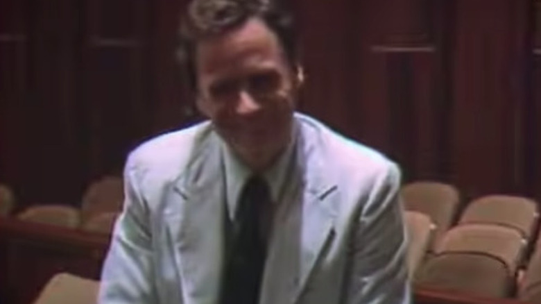 Ted Bundy smiling in court