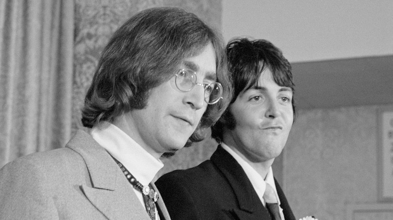 John Lennon and Paul McCartney posing together