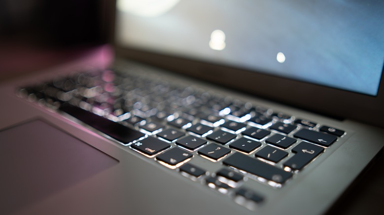 open laptop with backlit keyboard
