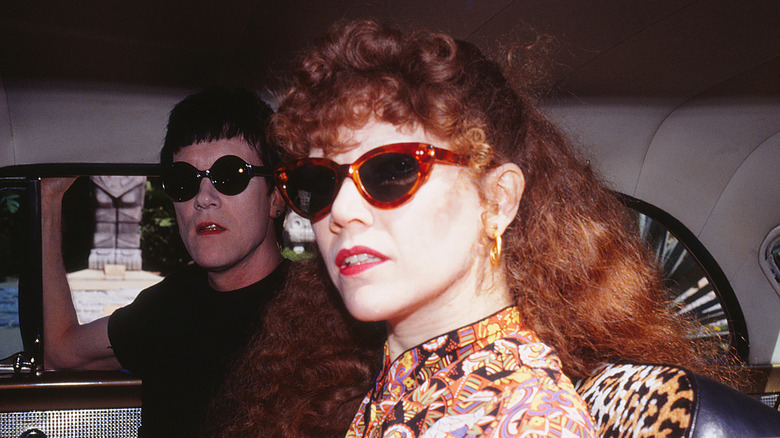 Lux Interior and Poison Ivy wearing sunglasses