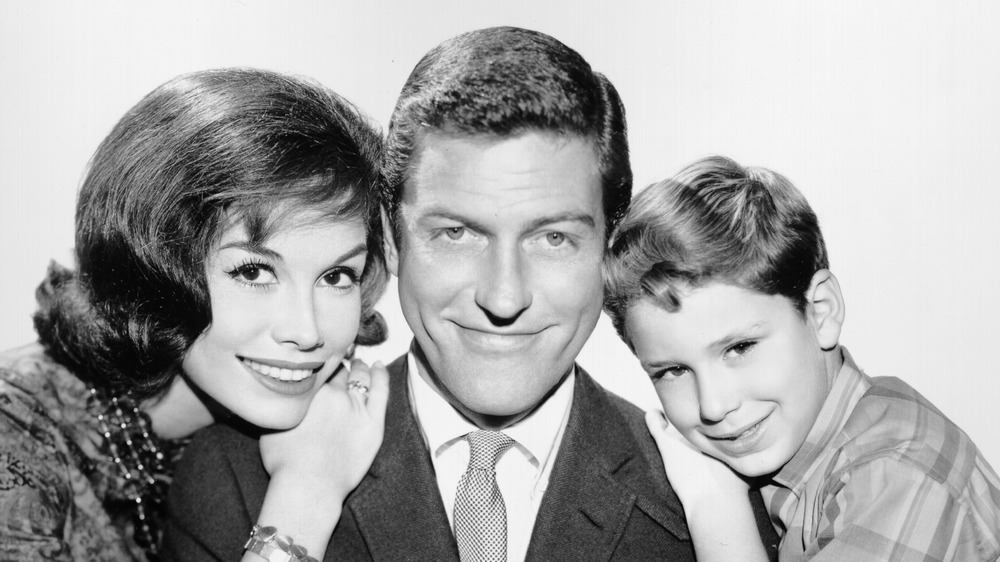 Dick Van Dyke with Mary Tyler Moore, Larry Matthews, all smiling 