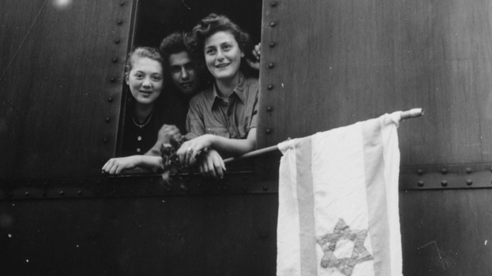 Girls on a train upon being released from Buchenwald concentration camp 
