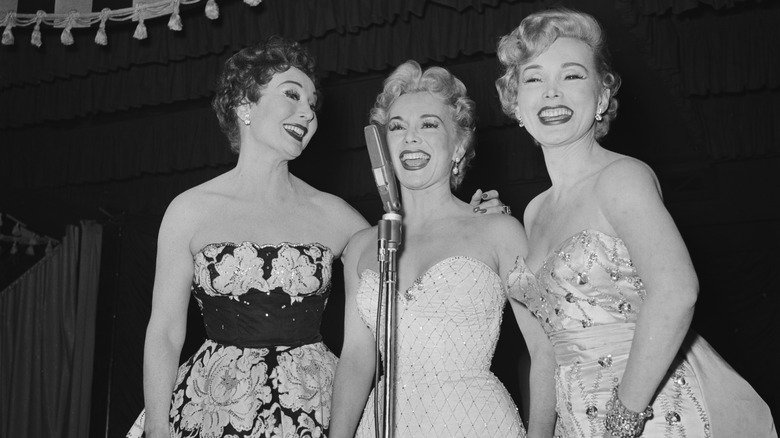 Gabor sisters standing on stage
